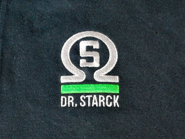 bestickung_starck Stickerei eines Firmenlogos